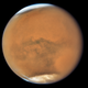 Mars, as imaged by Hubble on July 18. Its moon Phobos is on the right.